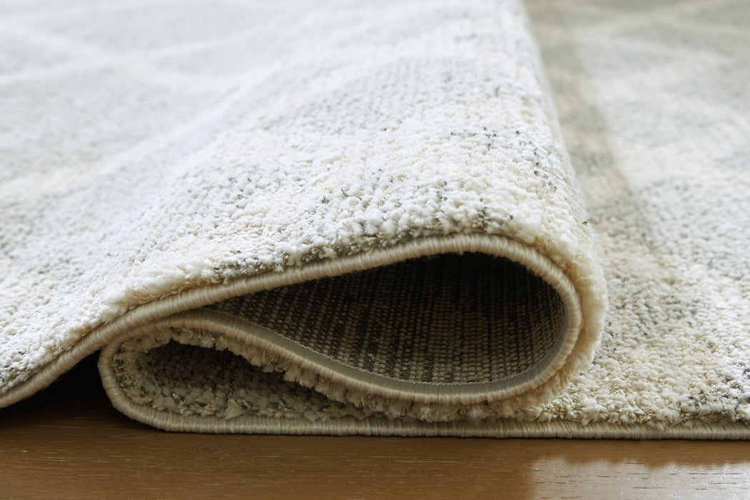 Unawick Large Rug - Home Furniture And More (Brentwood, MD)